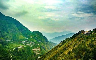 Scenic view of landscape against dramatic sky