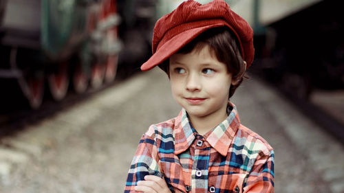 Portrait of boy standing outdoors