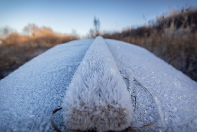 Close-up of snow on road