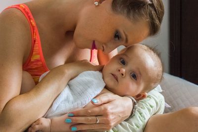 Portrait of mother and son baby