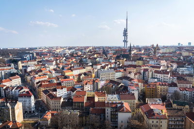 Aerial view of townscape against sky during sunset