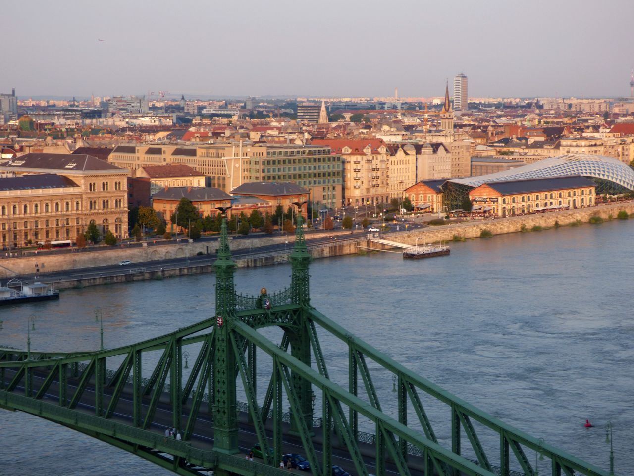 BRIDGE OVER RIVER AND BUILDINGS IN CITY