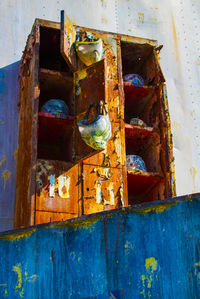 Close-up of old rusty metal container