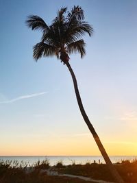 Scenic view of sea against sky at sunset