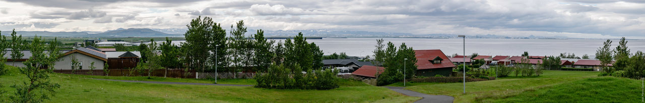 Panoramic view of sea against cloudy sky