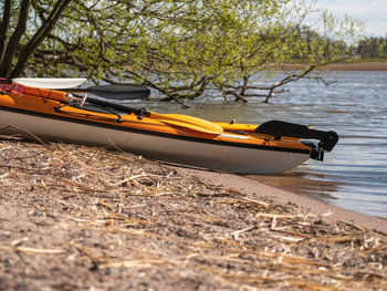 Boat moored on beach