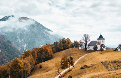 Scenic view of idyllic chapel on top of hill. nature, autumn, fall, landscape.