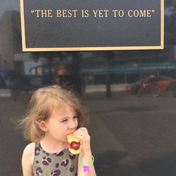 Portrait of girl eating ice cream