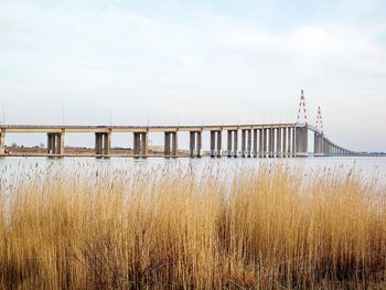 View of bridge over river against sky