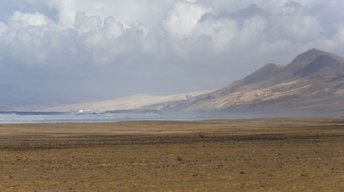 Scenic view of desert against sky