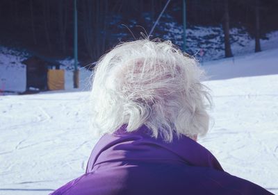 Portrait of woman covered with snow