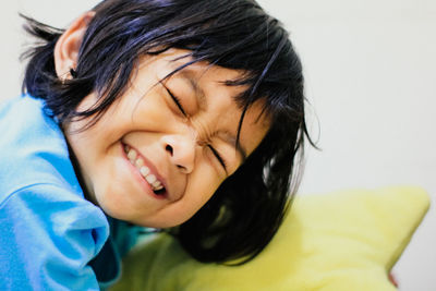 Close-up portrait of smiling girl