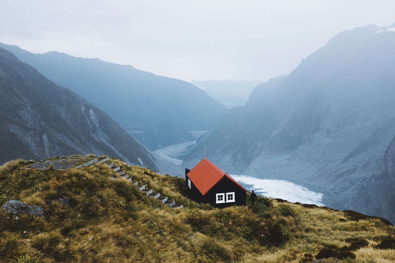 mountain, mountain range, scenics - nature, beauty in nature, tranquil scene, sky, nature, non-urban scene, no people, tranquility, day, environment, idyllic, landscape, fog, built structure, architecture, road, remote, outdoors, mountain peak