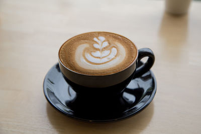 Coffee cup on table