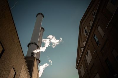 Low angle view of skyscraper against sky