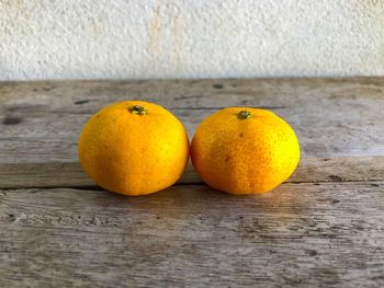 Close-up of oranges on table