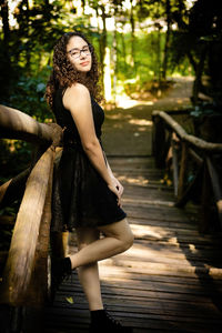 Portrait of young woman in park