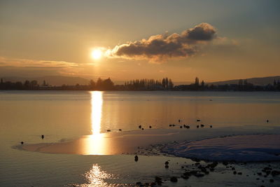 Scenic view of sea against sky during sunset