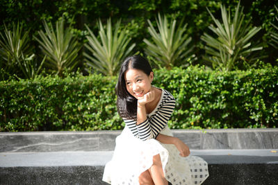 Portrait of young woman smiling