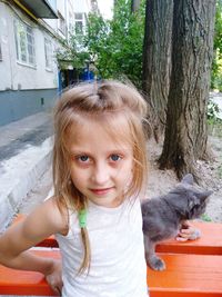 Portrait of cute girl outdoors