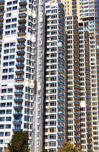 Low angle view of modern buildings in city