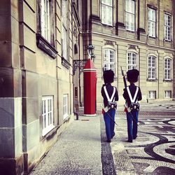 Full length of woman standing in city