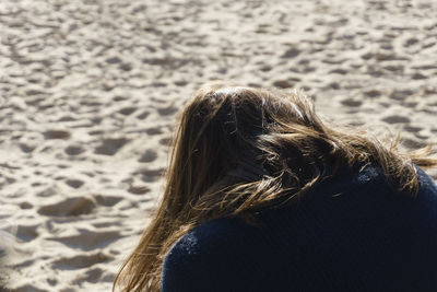 Rear view of woman at beach