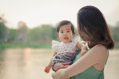Portrait of mother and daughter