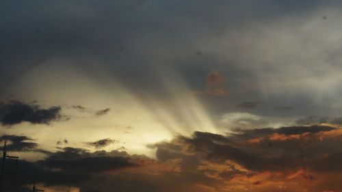 Low angle view of dramatic sky during sunset