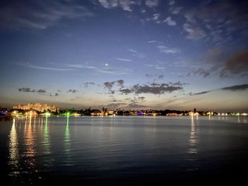 Scenic view of sea against sky at night