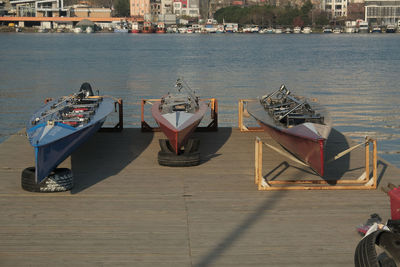 Boats moored at harbor