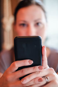 Portrait of woman using mobile phone