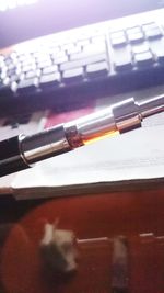 Close-up of pen on table