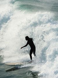 Man surfing in sea