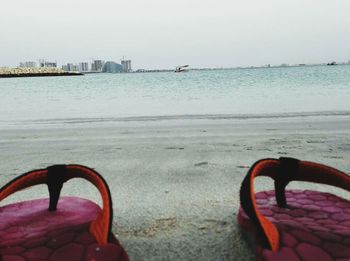 Scenic view of beach against clear sky