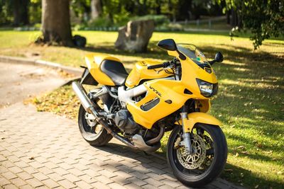 Motorcycle on street in field