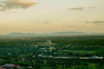 Scenic view of landscape against sky during sunset