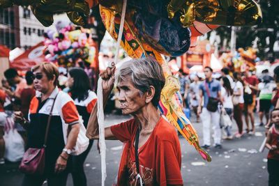 Group of people on street in city