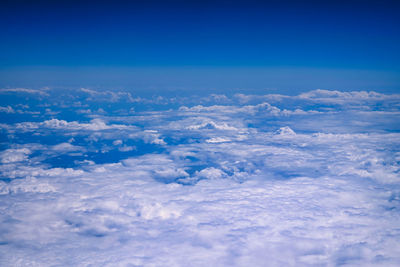 Aerial view of cloudscape against blue sky