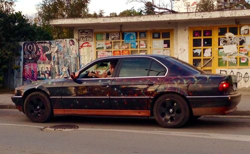 Car parked on sidewalk