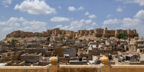 Panoramic view of historical building against cloudy sky