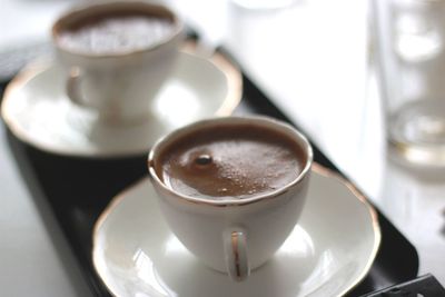 Close-up of coffee cup on table