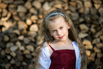 Portrait of girl standing outdoors