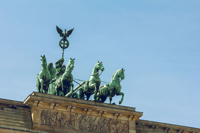 Low angle view of statue against clear sky