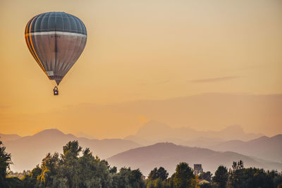 Hot air balloon against sky during sunset