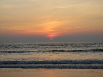 Scenic view of sea at sunset