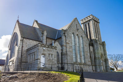 Exterior of historic building against clear blue sky