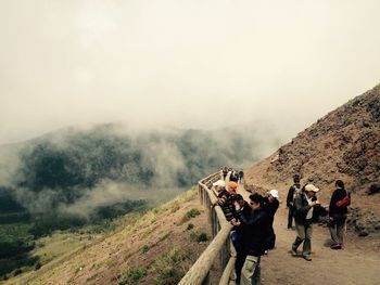 Tourists on mountain peak