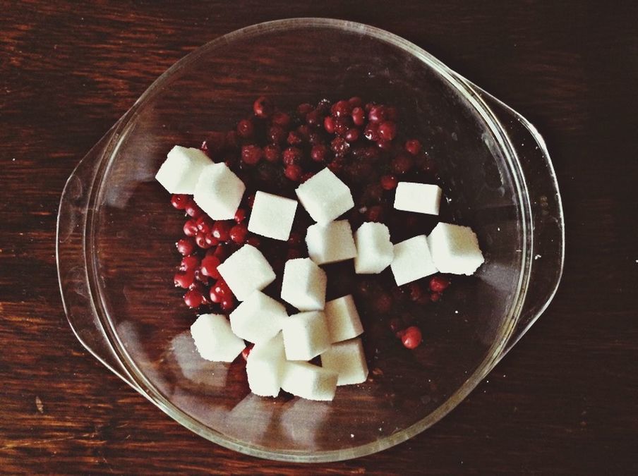 food and drink, freshness, indoors, food, table, sweet food, still life, dessert, fruit, strawberry, indulgence, ready-to-eat, high angle view, plate, raspberry, red, healthy eating, temptation, bowl, cake