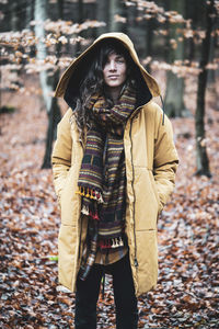 Woman standing in park during autumn